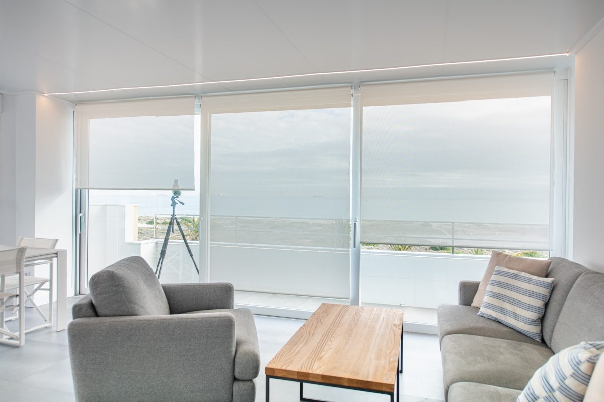 Reforma de apartamento en el Saler Valencia Sala de estar con vistas al mar
