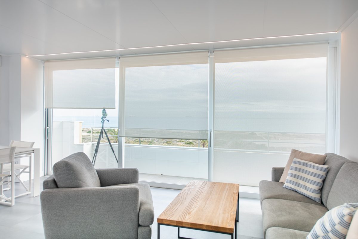Reforma de apartamento en el Saler Valencia Sala de estar con vistas al mar