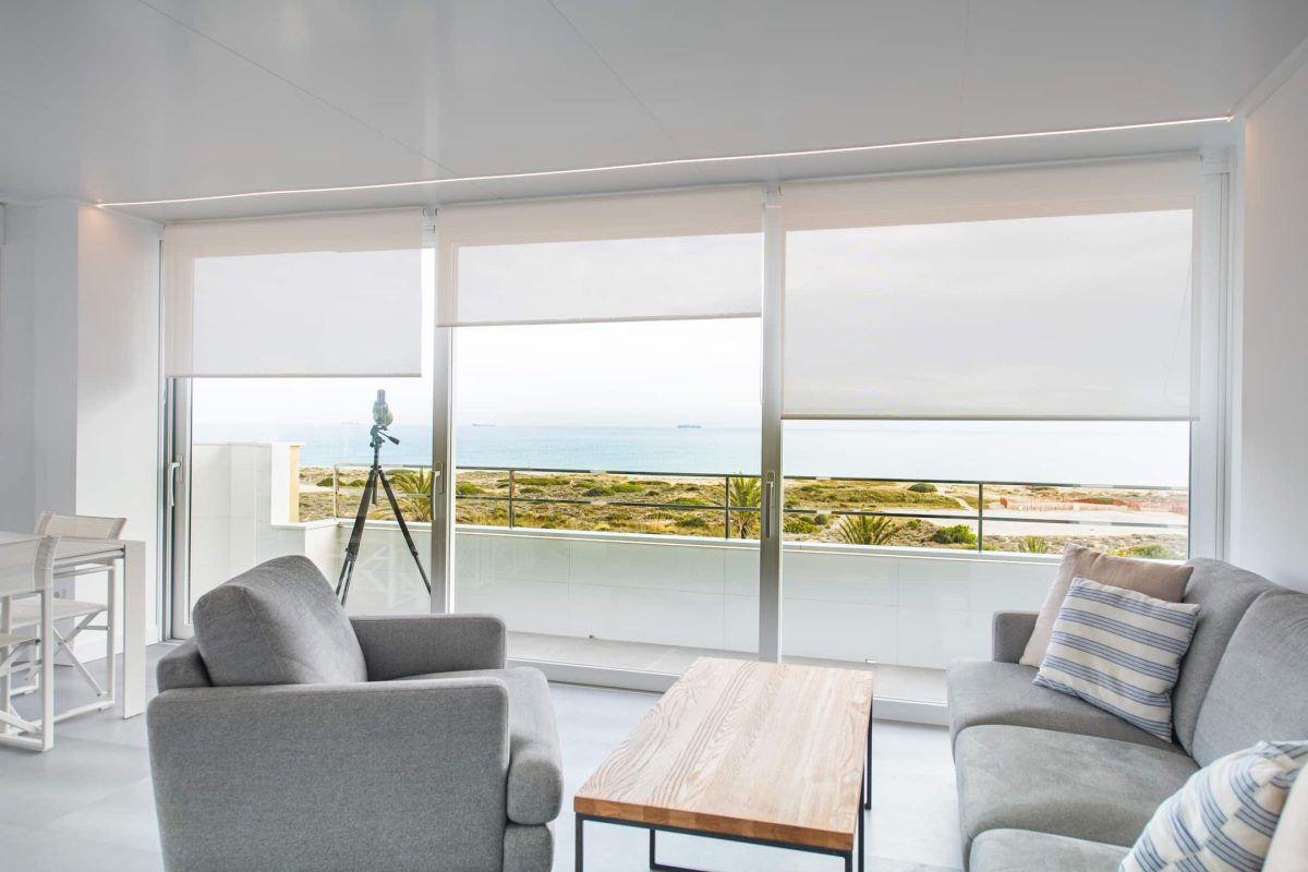 Reforma de apartamento en el Saler Valencia Sala de estar con vistas al mar